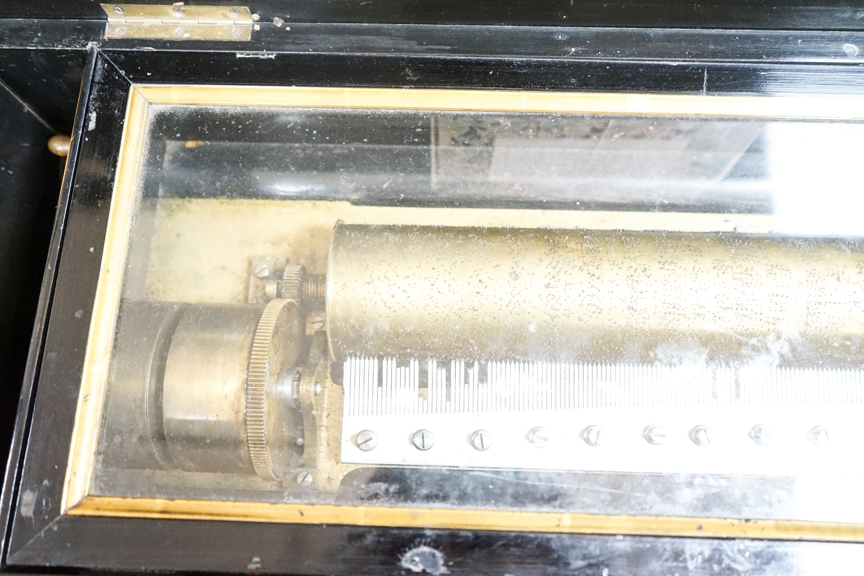 A 19th century Swiss cylinder musical box, (af) cylinder 38cm